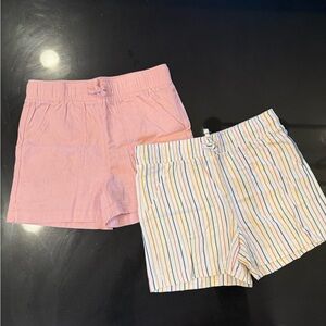 Brand new, never worn set of 2 girls shorts in size medium (10-12).